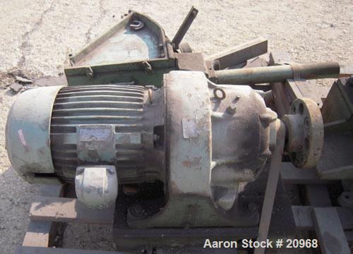 Used Banbury Mixer, Model 00, Carbon Steel. Chrome plated steel rotor, body and ends. Capacity 5 pounds at 1.25 SP gravity, cored rotors and bowl. Flat style floating weight. Side open swing doors (2...