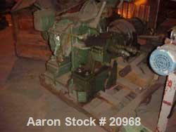 Used Banbury Mixer, Model 00, Carbon Steel. Chrome plated steel rotor, body and ends. Capacity 5 pounds at 1.25 SP gravity, cored rotors and bowl. Flat style floating weight. Side open swing doors (2...