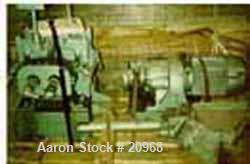 Used Banbury Mixer, Model 00, Carbon Steel. Chrome plated steel rotor, body and ends. Capacity 5 pounds at 1.25 SP gravity, cored rotors and bowl. Flat style floating weight. Side open swing doors (2...