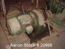 Used Banbury Mixer, Model 00, Carbon Steel. Chrome plated steel rotor, body and ends. Capacity 5 pounds at 1.25 SP gravity, cored rotors and bowl. Flat style floating weight. Side open swing doors (2...