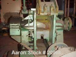 Used Banbury Mixer, Model 00, Carbon Steel. Chrome plated steel rotor, body and ends. Capacity 5 pounds at 1.25 SP gravity, cored rotors and bowl. Flat style floating weight. Side open swing doors (2...