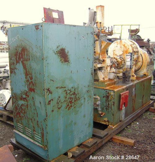 Used Farrel-Birmingham Banbury Mixer,  Model B, Carbon Steel. 2.6 pound capacity, side open design. Air operated feed ram with flat style floating weight. Two wing rotor. 4 speed drive. Driven by a 2...