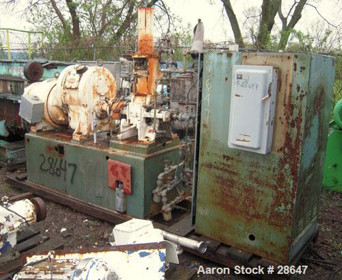Used Farrel-Birmingham Banbury Mixer,  Model B, Carbon Steel. 2.6 pound capacity, side open design. Air operated feed ram with flat style floating weight. Two wing rotor. 4 speed drive. Driven by a 2...