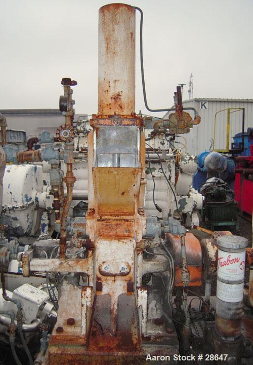 Used Farrel-Birmingham Banbury Mixer,  Model B, Carbon Steel. 2.6 pound capacity, side open design. Air operated feed ram with flat style floating weight. Two wing rotor. 4 speed drive. Driven by a 2...