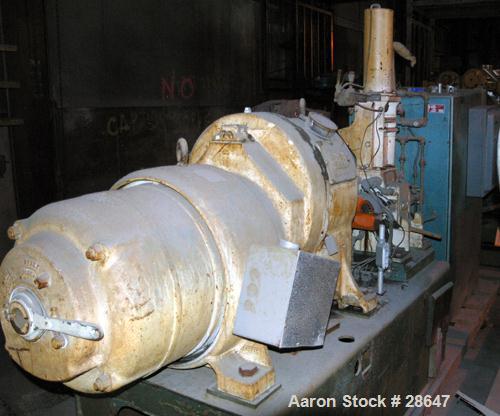 Used Farrel-Birmingham Banbury Mixer,  Model B, Carbon Steel. 2.6 pound capacity, side open design. Air operated feed ram with flat style floating weight. Two wing rotor. 4 speed drive. Driven by a 2...