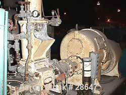 Used Farrel-Birmingham Banbury Mixer,  Model B, Carbon Steel. 2.6 pound capacity, side open design. Air operated feed ram with flat style floating weight. Two wing rotor. 4 speed drive. Driven by a 2...