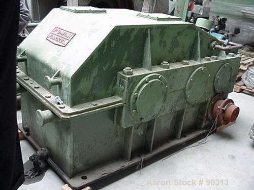 Used Farrel Pomini Banbury Mixer, Model F80. Jacketed chamber, drop door design. 4 wing style cored rotors, approximately 35-70 rpm. Mixing chamber 21.2 gallon (80 liter), max batch weight 132 pounds...