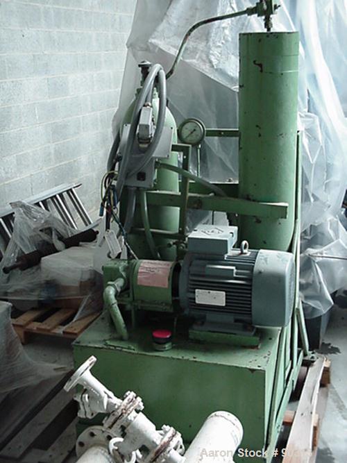 Used Farrel Pomini Banbury Mixer, Model F80. Jacketed chamber, drop door design. 4 wing style cored rotors, approximately 35-70 rpm. Mixing chamber 21.2 gallon (80 liter), max batch weight 132 pounds...