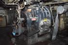 Used Farrel Banbury Mixer, Model 9D. Approximate chamber gross volume 182 liters (48 gallons, 11,120 cubic inches), approximate compound capacity 390 pounds. Jacketed chrome plated sides and door top...