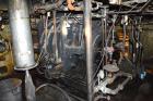 Used Farrel Banbury Mixer, Model 9D. Approximate chamber gross volume 182 liters (48 gallons, 11,120 cubic inches), approximate compound capacity 390 pounds. Jacketed chrome plated sides and door top...