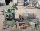 Used Banbury Mixer, Model 00, Carbon Steel. Chrome plated steel rotor, body and ends. Capacity 5 pounds at 1.25 SP gravity, cored rotors and bowl. Flat style floating weight. Side open swing doors (2...