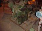 Used Banbury Mixer, Model 00, Carbon Steel. Chrome plated steel rotor, body and ends. Capacity 5 pounds at 1.25 SP gravity, cored rotors and bowl. Flat style floating weight. Side open swing doors (2...