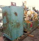 Used Farrel-Birmingham Banbury Mixer,  Model B, Carbon Steel. 2.6 pound capacity, side open design. Air operated feed ram with flat style floating weight. Two wing rotor. 4 speed drive. Driven by a 2...