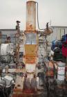 Used Farrel-Birmingham Banbury Mixer,  Model B, Carbon Steel. 2.6 pound capacity, side open design. Air operated feed ram with flat style floating weight. Two wing rotor. 4 speed drive. Driven by a 2...