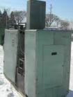 Used Farrel Banbury Mixer, Model 00C. Jacketed chamber, drop door design, rated 150 PSI water or steam. Wing style cored rotors, approximately 125/62.5 RPM. Gross chamber liquid capacity 1.2 gallons....
