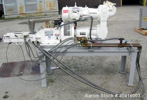 Used Teledyne Readco 2" twin screw continuous processor, 434 stainless steel.  (2) 2" diameter x approximately 17 1/2" long shafts.  Carbon steel jacketed chamber, clamshell design, rated 150 psi at ...