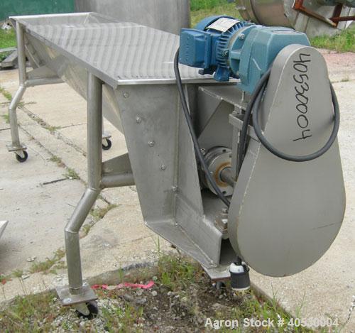 Used Continuous screw mixer, 316 stainless steel. 9" diameter x 105" long x 4 1/2" centers open screw, 2 3/4" diameter shaft. Non-jacketed U-trough 23 1/2" wide x 10' long x 16" deep. 8" end bottom o...