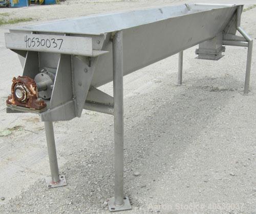 Used Continuous Screw/Paddle Mixer, 316 stainless steel. 9" diameter x 96" long x 4 1/2" centers open screw, 18" long 1/4" thick bolt on paddle section, 2 3/4" diameter shaft. Non-jacketed U-trough 2...