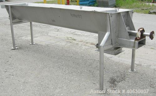 Used Continuous Screw/Paddle Mixer, 316 stainless steel. 9" diameter x 96" long x 4 1/2" centers open screw, 18" long 1/4" thick bolt on paddle section, 2 3/4" diameter shaft. Non-jacketed U-trough 2...