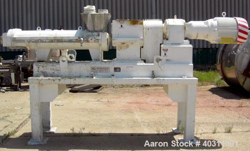 Used Teledyne Readco 7 7/8" Twin Shaft Screw Processor, 304 stainless steel. (2) 7 7/8" diameter x approximate 60" long shafts. Carbon steel jacketed clamshell design, barrel rated 150 psi at 450 deg...