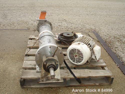 Used Paddle Style Continuous Mixer, 431 Stainless Steel. 8" diameter x 50" long non-jacketed chamber, 2" diameter shaft with 1-1/2" wide x 1/4" thick screw in paddles. 4" x 4" top feed, 4" x 4" end b...