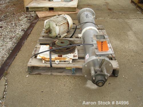 Used Paddle Style Continuous Mixer, 431 Stainless Steel. 8" diameter x 50" long non-jacketed chamber, 2" diameter shaft with 1-1/2" wide x 1/4" thick screw in paddles. 4" x 4" top feed, 4" x 4" end b...