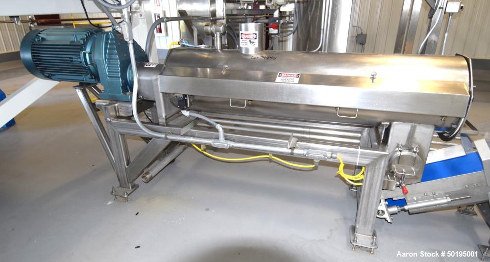 Used GEM Equipment Continuous Mixer, Stainless Steel. Clamshell non-jacketed chamber approximate 16" diameter x 65" long. Single shaft with approximate 2-1/2" wide x 3/8" thick paddles. Top end feed,...