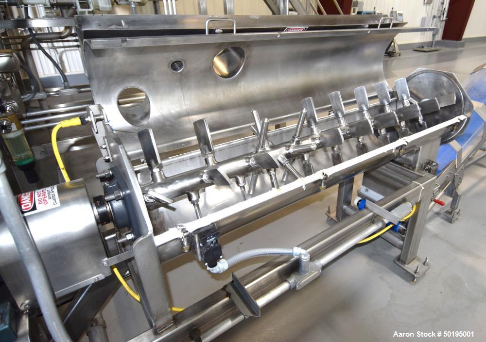 Used GEM Equipment Continuous Mixer, Stainless Steel. Clamshell non-jacketed chamber approximate 16" diameter x 65" long. Single shaft with approximate 2-1/2" wide x 3/8" thick paddles. Top end feed,...