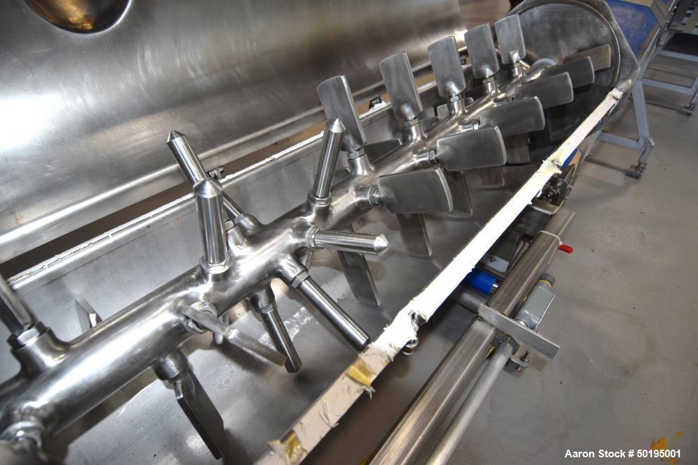 Used GEM Equipment Continuous Mixer, Stainless Steel. Clamshell non-jacketed chamber approximate 16" diameter x 65" long. Single shaft with approximate 2-1/2" wide x 3/8" thick paddles. Top end feed,...