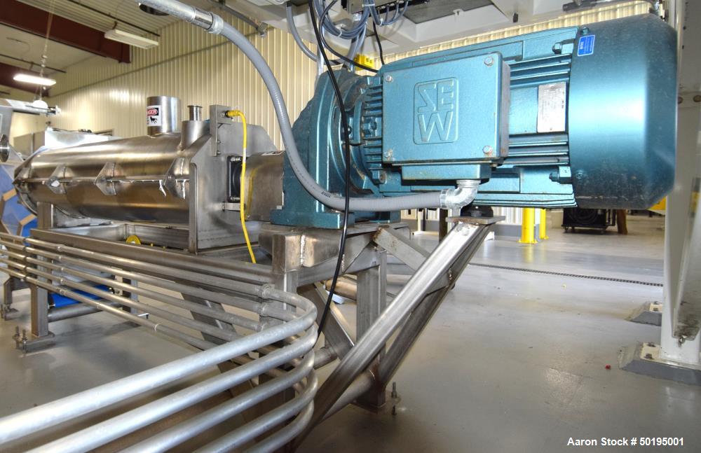 Used GEM Equipment Continuous Mixer, Stainless Steel. Clamshell non-jacketed chamber approximate 16" diameter x 65" long. Single shaft with approximate 2-1/2" wide x 3/8" thick paddles. Top end feed,...