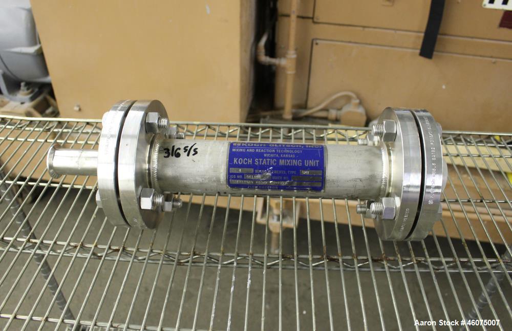 Used Koch-Glitsch Static Mixer, Type SMX, Stainless Steel. (4) Mixing elements, approximate 2-1/2" diameter x 14" long chamber, 1-1/2" tri-clamp inlet/outlet. Job#914601.