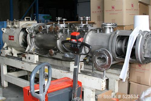 USED: List twin screw dryer/extruder/reactor, type AP80. Material of construction is stainless steel on product contact parts. 2 x 5-1/4" diameter x 49.5" straight side (134mm x 1270mm), side by side...