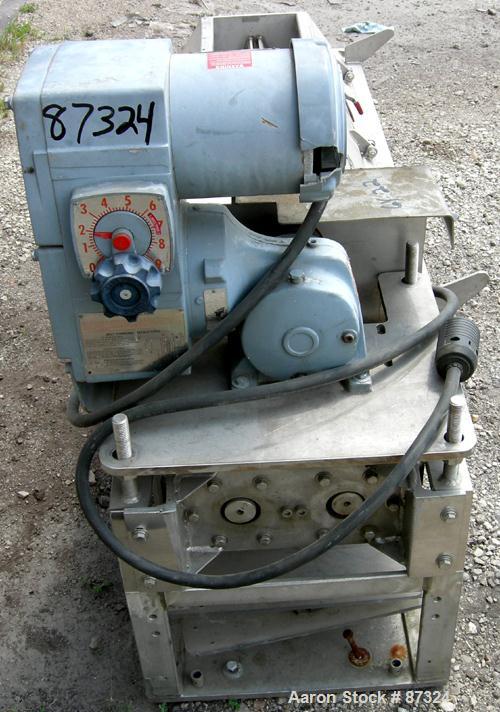 Used Dual Shaft Continuous Screw Blender, 304 Stainless Steel. (2) 8" Diameter x 44" long screws. Clamshell design non-jacketed trough. Top end feed, end bottom discharge. Driven by a 1 HP, 3/60/230/...