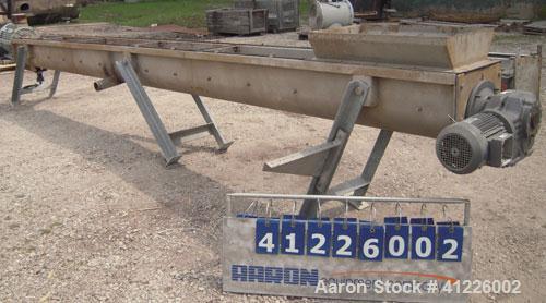 Used Continuous "L" Shaped Mixer consisting of: (1) Horizontal section with an 11" diameter x 5" pitch single ribbon, 4130 carbon steel, 304 stainless steel trough, partially rubber lined, 12 1/2" wi...