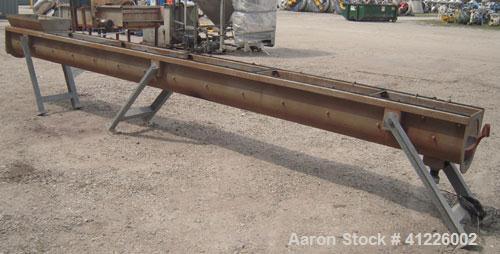 Used Continuous "L" Shaped Mixer consisting of: (1) Horizontal section with an 11" diameter x 5" pitch single ribbon, 4130 carbon steel, 304 stainless steel trough, partially rubber lined, 12 1/2" wi...