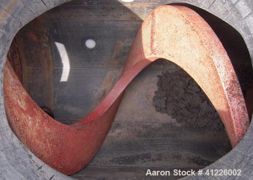 Used Continuous "L" Shaped Mixer consisting of: (1) Horizontal section with an 11" diameter x 5" pitch single ribbon, 4130 carbon steel, 304 stainless steel trough, partially rubber lined, 12 1/2" wi...