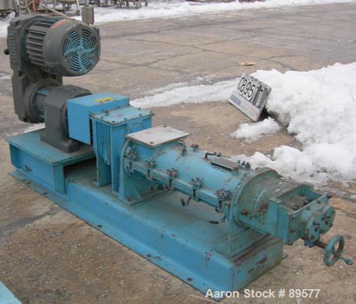 USED: Teledyne Readco 5" twin screw processor, 316 stainless steel. (2) 5" diameter x approximate 36" long shafts, clamshell design. Carbon steel jacketed chamber rated 150 psi at 300 deg F. 5" x 8" ...