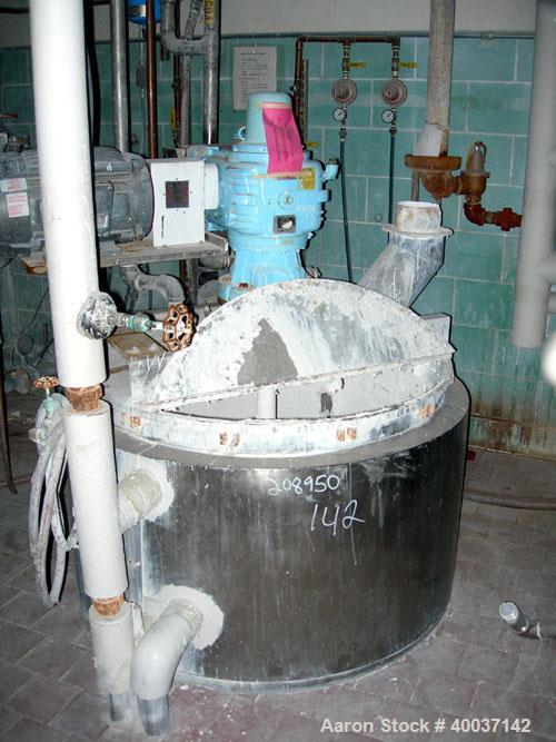 Used Used: Kady Mill, model 5C, stainless steel. Approximately 300 gallon capacity. 42" diameter x 68" deep jacketed tank. 8" diameter bottom blade, driven by a 100 hp motor. (2) side wall baffles, t...