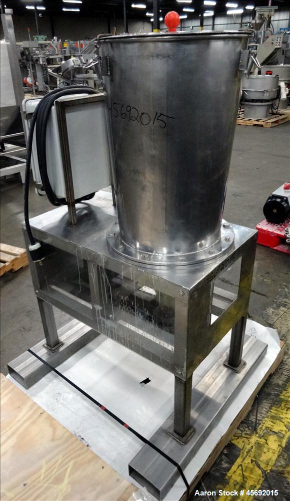 Used Fabricated Stainless Steel Mixing System, Approximately 25 gallons, Stainless Steel. 17-1/2" diameter x 25" straight side. (4) blade bottom mixer. Driven by 1.5Kw, 1725 rpm, 3/60/208-230/460 vol...