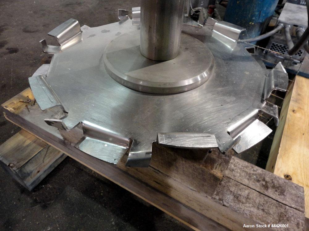 Used Bowers Disperser. 2-1/2" Diameter approximate 53" long 316 stainless steel shaft with a 304 stainless steel 18'' diameter saw tooth blade. Air/oil lift, adjustable tank holder. Driven by a 50 hp...