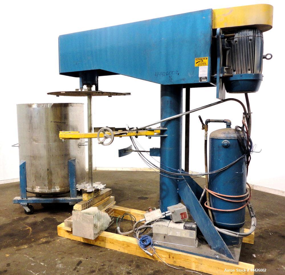 Used Bowers Disperser. 2-1/2” Diameter approximate 53” long 316 stainless steel shaft with a 304 stainless steel 18'' diameter saw tooth blade. Air/oil lift, adjustable tank holder. Driven by a 50hp,...