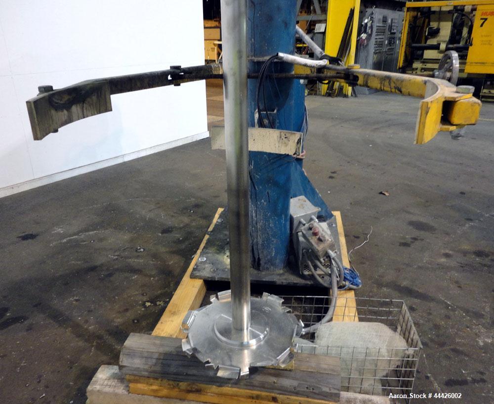 Used Bowers Disperser. 2-1/2” Diameter approximate 53” long 316 stainless steel shaft with a 304 stainless steel 18'' diameter saw tooth blade. Air/oil lift, adjustable tank holder. Driven by a 50hp,...