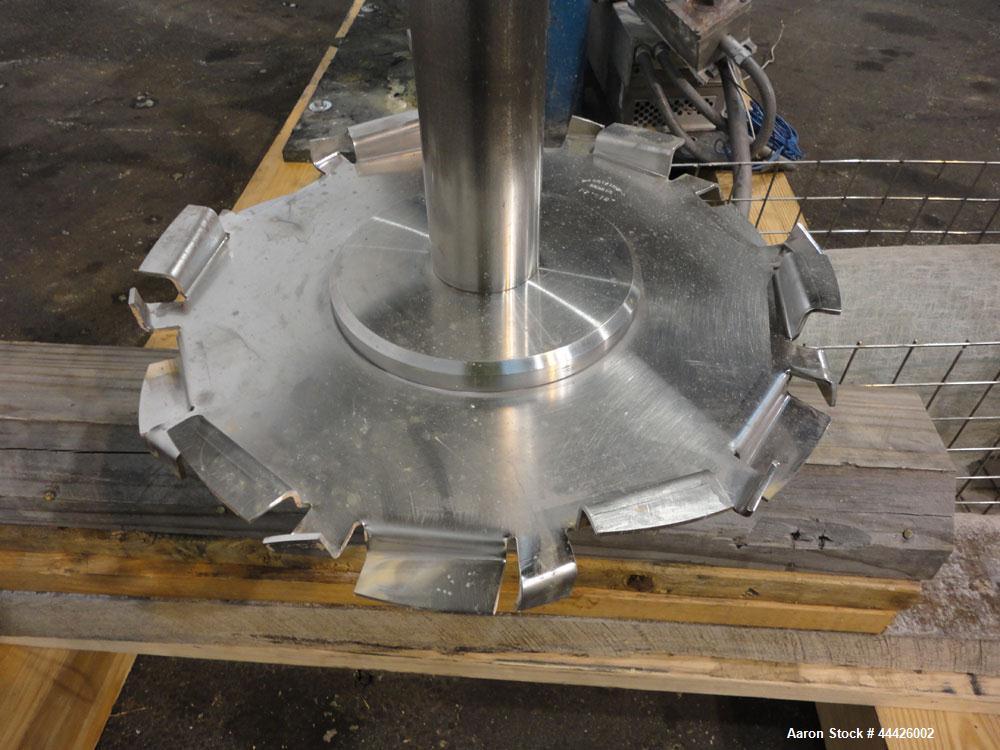Used Bowers Disperser. 2-1/2” Diameter approximate 53” long 316 stainless steel shaft with a 304 stainless steel 18'' diameter saw tooth blade. Air/oil lift, adjustable tank holder. Driven by a 50hp,...