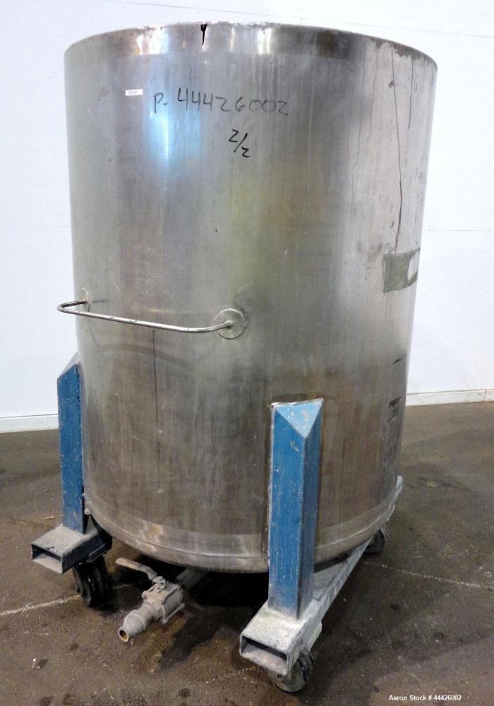 Used Bowers Disperser. 2-1/2” Diameter approximate 53” long 316 stainless steel shaft with a 304 stainless steel 18'' diameter saw tooth blade. Air/oil lift, adjustable tank holder. Driven by a 50hp,...