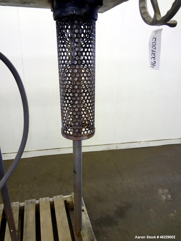Used Cowles Disperser, Model W-24-1X. 304 Stainless steel shaft 1-3/4" diameter x 46" long (no mixing blade). Driven by 10 hp, 3/60/230/460 volt, 1755 rpm xp motor. Air over oil lift with tank, manua...