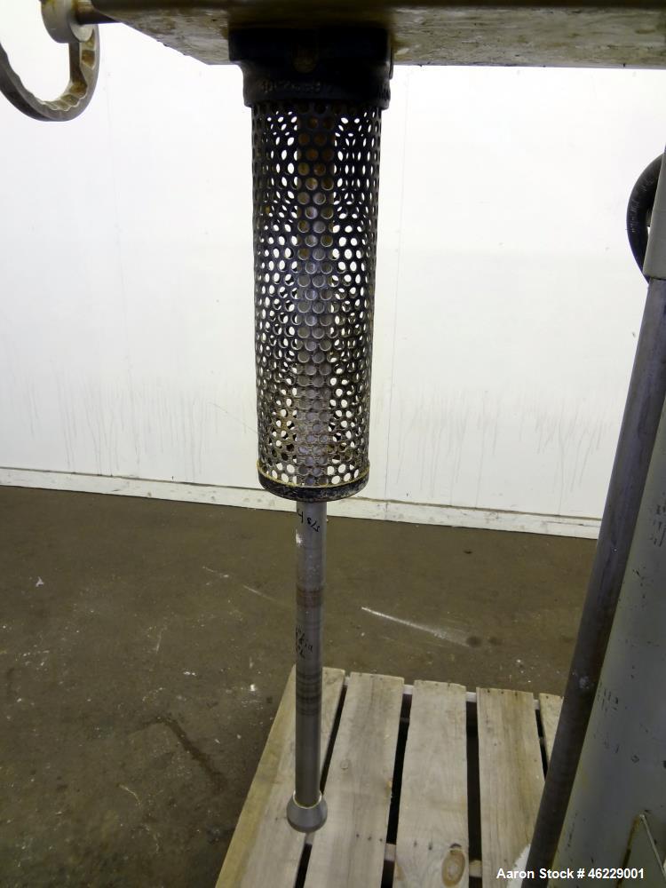 Used Cowles Disperser, Model W-241X. 304 Stainless steel shaft 1-3/4" diameter x 46" long (no mixing blade). Driven by 10 hp, 3/60/230/460 volt, 1755 rpm xp motor. Air over oil lift with tank, manual...