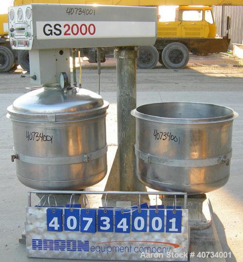 Used Gruber Tech Vacuum Mixer, model GS2000, 304 stainless steel. Dual stationary non-jacketed mixing cans, approximately 55 gallon, 500 pound capacity each. 28'' diameter x 24'' deep. Stainless stee...