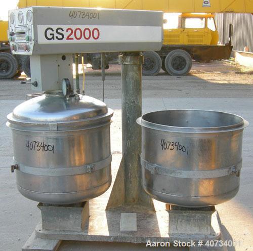 Used Gruber Tech Vacuum Mixer, model GS2000, 304 stainless steel. Dual stationary non-jacketed mixing cans, approximately 55 gallon, 500 pound capacity each. 28'' diameter x 24'' deep. Stainless stee...