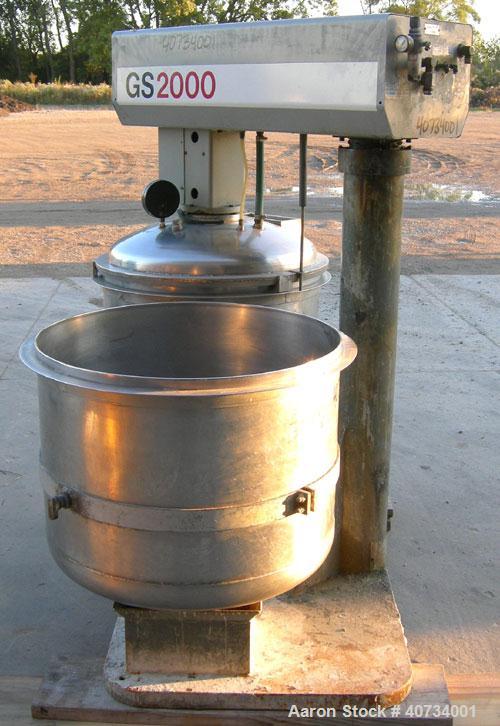 Used Gruber Tech Vacuum Mixer, model GS2000, 304 stainless steel. Dual stationary non-jacketed mixing cans, approximately 55 gallon, 500 pound capacity each. 28'' diameter x 24'' deep. Stainless stee...