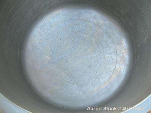 Used Gruber Tech Vacuum Mixer, model GS2000, 304 stainless steel. Dual stationary non-jacketed mixing cans, approximately 55 gallon, 500 pound capacity each. 28'' diameter x 24'' deep. Stainless stee...